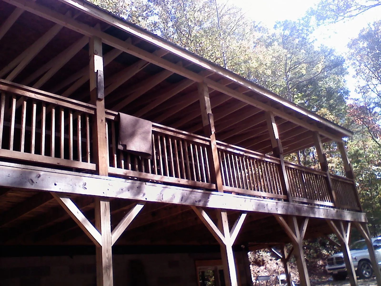 Timber framing under a new elevated porch and deck — Roof Leak Repair in Paulina by Roofing Brothers